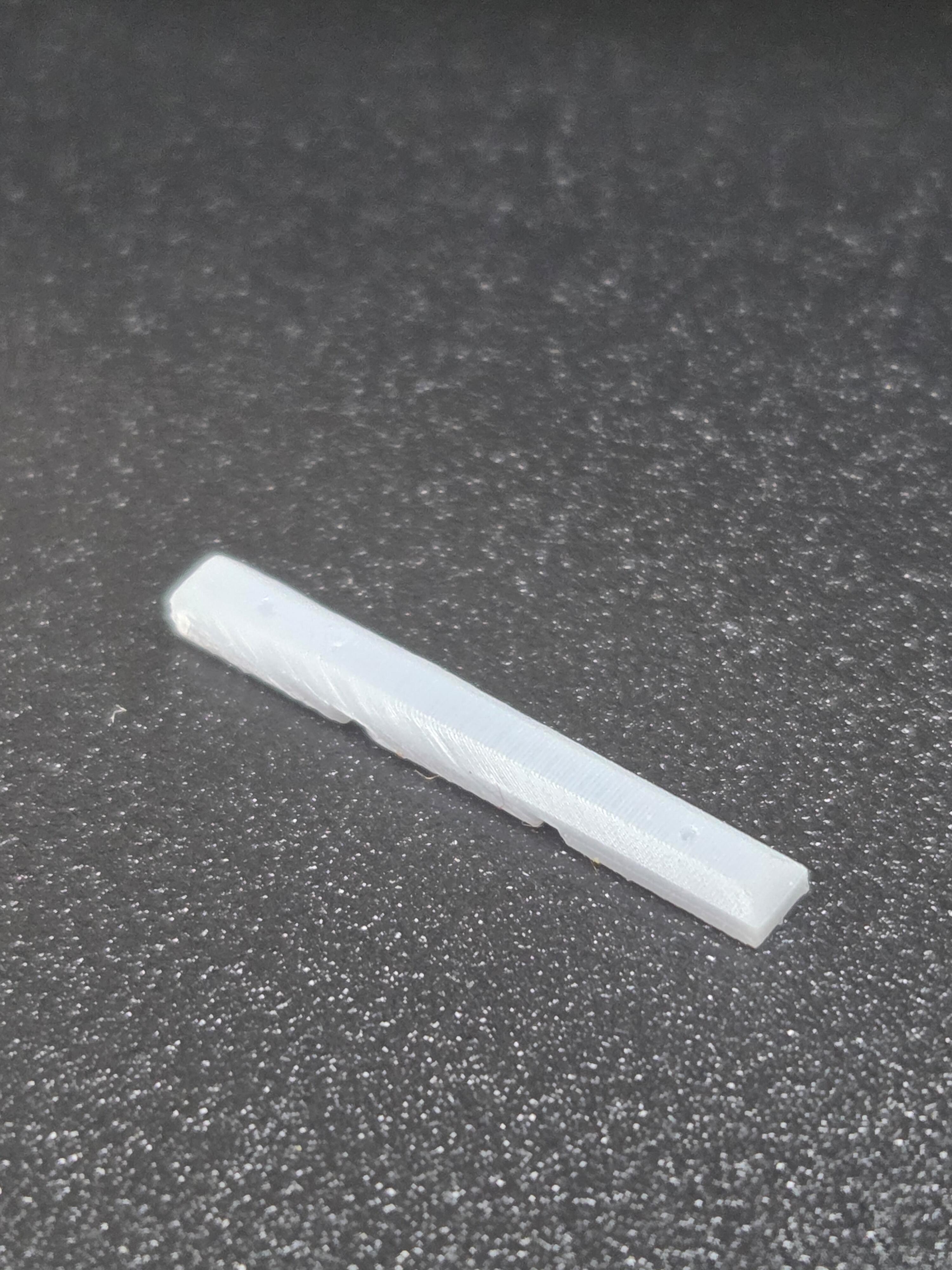 HO SCALE PARKING BUMPERS (12 PER PACK)